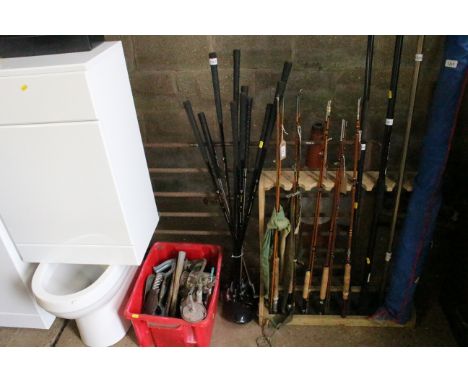 A quantity of Dunlop and other golf clubs to include woods, irons, putter etc.