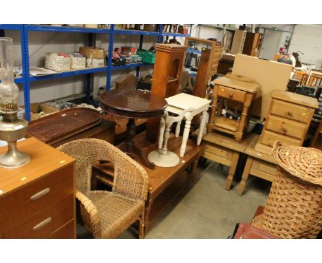 A pine coffee table; a pine cheval mirror; a pine wall shelf; two tripod tables; an occasional table and a  cane chair 