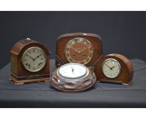 A mantel clock; others; a barometer (4)