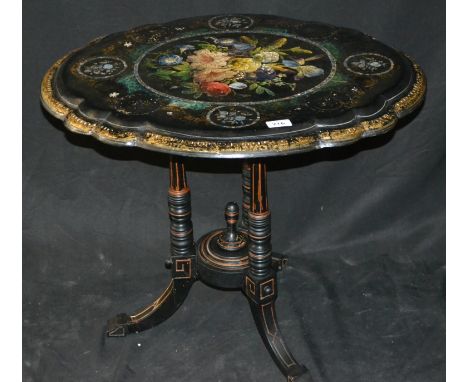 A Victorian papier mache topped shaped oval occasional table, painted floral decoration, tripod base with under tier, 65cm x 