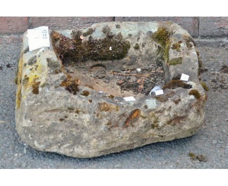 A stoneware trough