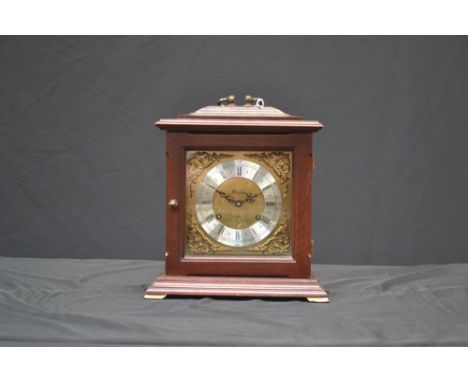 A mahogany cased mantel clock