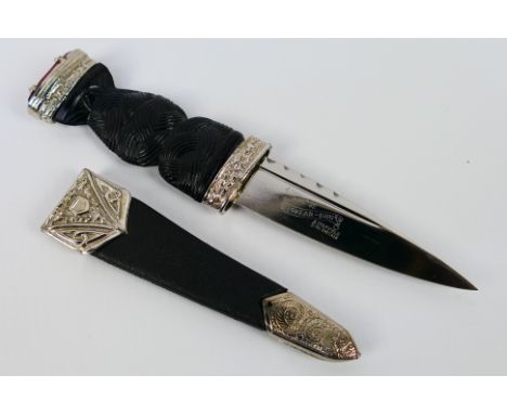 A J Nowill & Sons Ltd Sgian Dubh knife with sheath. [W]

Note: This lot is not for sale to people under the age of 18. By bid