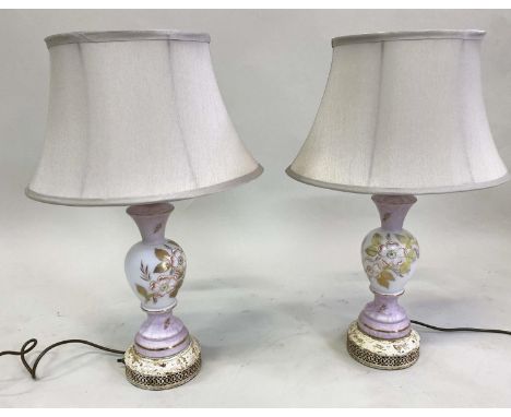 TABLE LAMPS, a pair, vintage opaline with floral gilt decoration and incised plinth (with shades), 59cm H. 