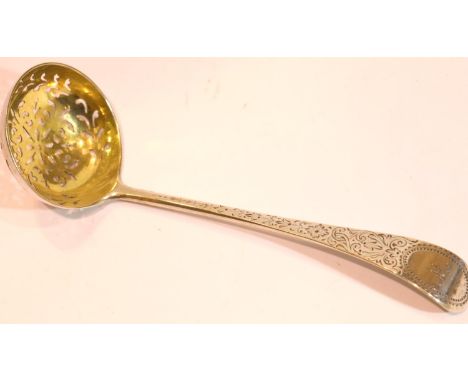 Victorian hallmarked silver sifting spoon with engraved handle and gilt washed bowl, London assay 1876, 40g. P&amp;P Group 1 