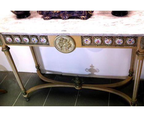 French marble top console table, brass mounted and surmounted with painted porcelain panels, L: 108 cm. Not available for in-