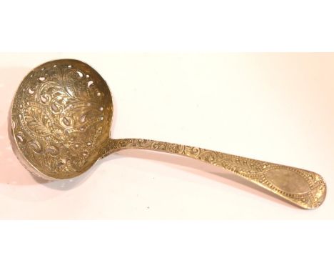 Decorative hallmarked silver sifting spoon. P&amp;P Group 1 (£14+VAT for the first lot and £1+VAT for subsequent lots) 
