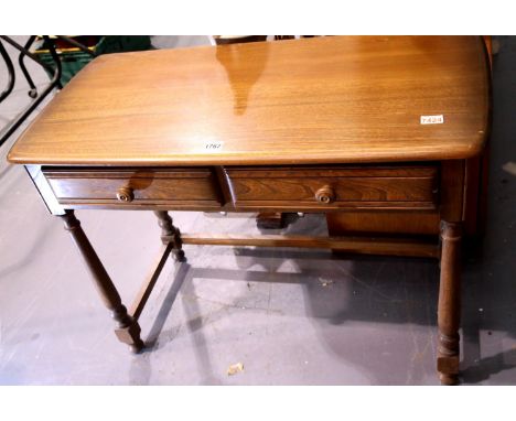 Ercol vintage elm two drawer console table, H: 74 cm. Not available for in-house P&P.Condition Report: Few marks all over but