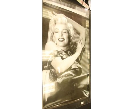Marilyn Monroe, three large publicity shot posters (1985-2007) each 90 x 60 cm and a Marilyn Monroe 1974 wall calendar, 103 x