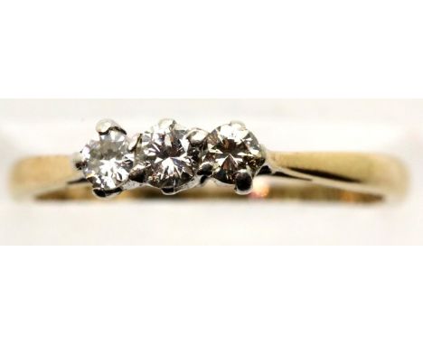 18ct gold three diamond set ring, size M, 1.9g. P&amp;P Group 1 (£14+VAT for the first lot and £1+VAT for subsequent lots) 