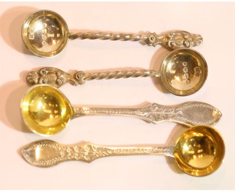 Victorian pair of mustard spoons, each having gilt washed bowls, and a further pair of Victorian silver condiment spoons, com