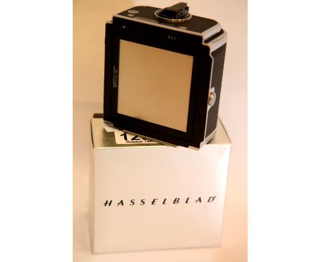 Boxed Hasselblad film cartridge for 500 C/M, 500 EL/M, 2000FC. P&amp;P Group 2 (£18+VAT for the first lot and £3+VAT for subs