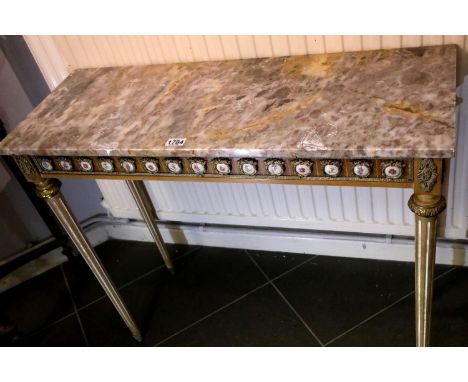 Rectangular French marble top console table, mounted with limoges type plaques and raised on tapering supports, L: 93 cm. Not