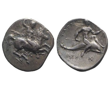 Southern Apulia, Tarentum, c. 315-302 BC. AR Nomos (22mm, 7.61g, 7h). Warrior, holding shield and two spears, preparing to ca