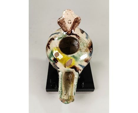 Ca.1000 AD Medieval Islamic terracotta glazed clay molded oil lamp with geometric design relief and multicolor glaze characte