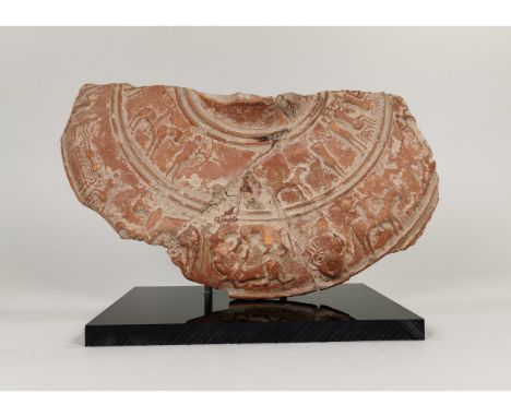 Ca.100 AD. A Romano- Egyptian ceramic plaque of a much larger terracotta basin with intricate relief of hunting and ceremonia