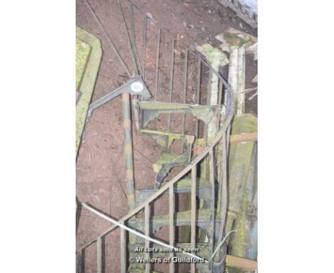 *CAST IRON SPIRAL STAIRCASE COMPRISING OF TWELVE TREADS (SOME A/F), SPINDLES, HANDRAIL AND CENTRAL POLE