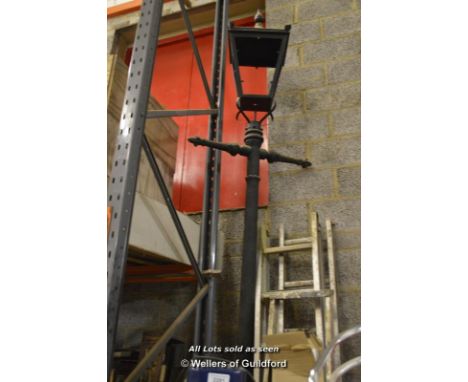 *REPRODUCTION BLACK CAST IRON SINGLE LANTERN  APPROX 13 FEET HIGH 