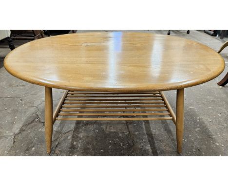 Ercol mid 20th century light coffee table. Approx. 45 x 100 x 83cms
reasonable used with scuffs scratches discolour to top in