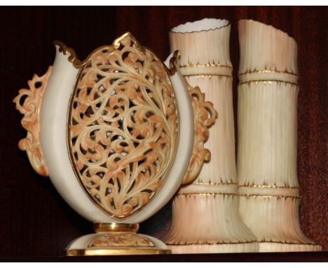 A Locke & Co Worcester china triple vase formed as bamboo and a Grainger's Worcester vase decorated pierced panels