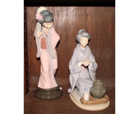 Two Lladro porcelain figures of a Japanese lady holding a fan and a Japanese tea ceremony
