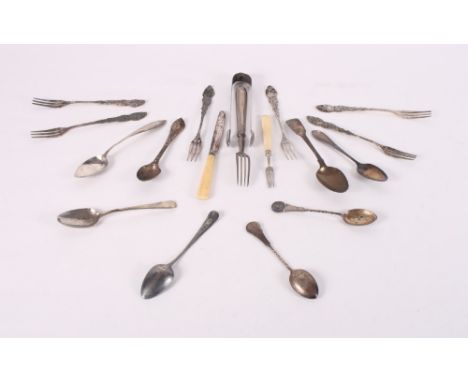 A quantity of silver and white metal flatware, etc