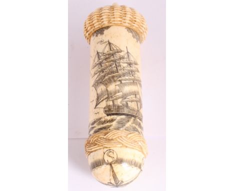 A cylindrical bone case carved sailing ship and compass points