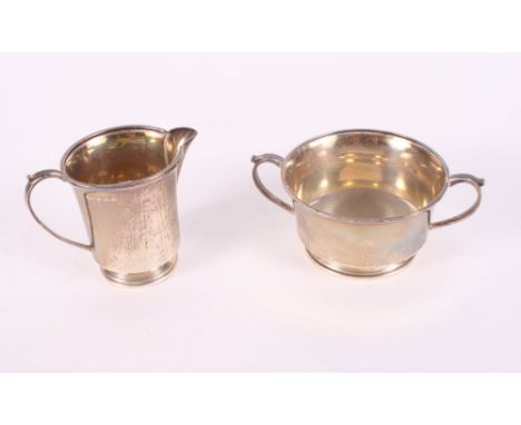 A silver two-handled sugar basin and a matching milk jug, 6.8oz troy approx