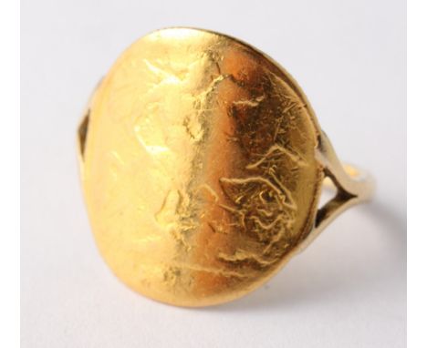 An 18ct gold dress ring mounted a half sovereign (very worn), 5.5g