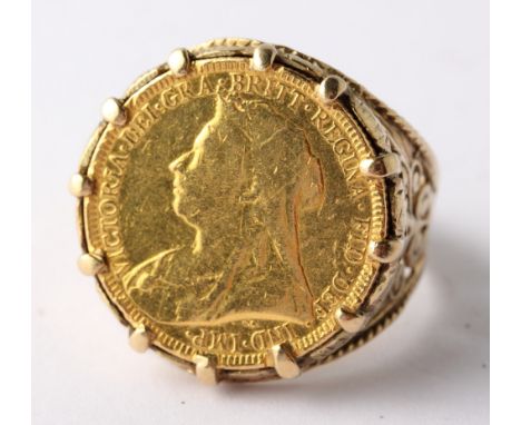 A 9ct gold ring set with an 1894 gold sovereign, 13.7g