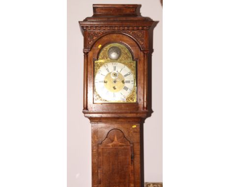 A late 19th Century oak inlaid long case clock with eight-day striking and chiming movement by Pitt of Frome, brass dial, cad