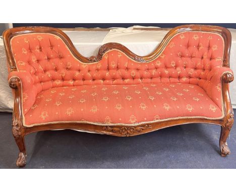 A Victorian style mahogany framed double end sofa in deep buttoned upholstery. H.92 W.188 D.70cm 