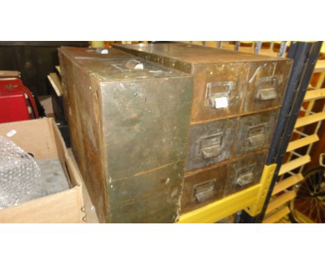 A vintage steel stack of six industrial steel index filing drawers and one other