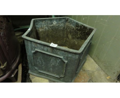 A lead five sided planter with moulded panels, together with a set of art and crafts style fire irons plus a small run of for
