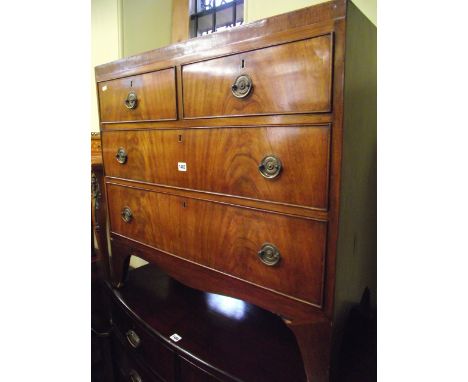 A Georgian mahogany chest of two long and two short drawers with caddy top, embossed brass fittings, raised on swept supports
