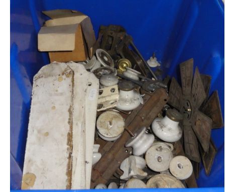 A box containing a quantity of Victorian and later door furniture to include white glazed ceramic finger plates, knob handles