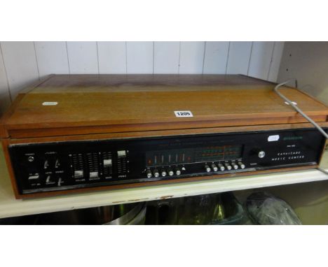 A Dynatron Cavalcade Music Centre, SRX30B with Solid State Stereophonic Tuner Amplifier, combined turntable and cassette reco