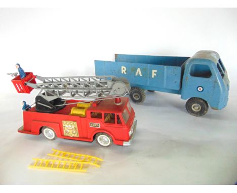 A Lyon Bros tin plate lorry with RHF Livery and a Japanese fire fender with extending ladder