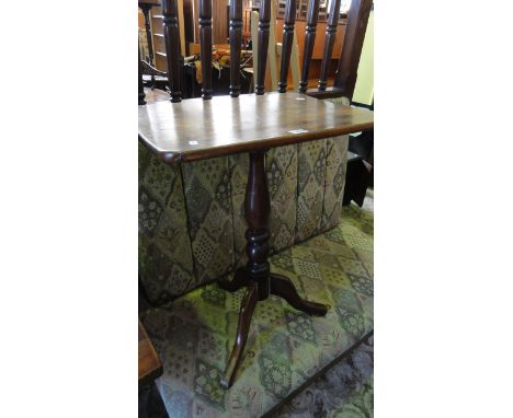 A Victorian mahogany snap top occasional table of rectangular form raised on a central turned pillar and shaped tripod, toget