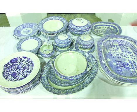 A quantity of Wedgwood and Co blue and white printed Hawthorn pattern dinner wares comprising three oval graduated meat plate