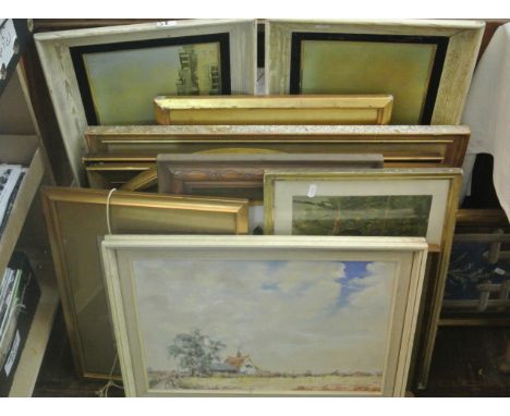 A quantity of pictures and prints including an oil painting on board of a landscape with a red roofed house signed bottom rig