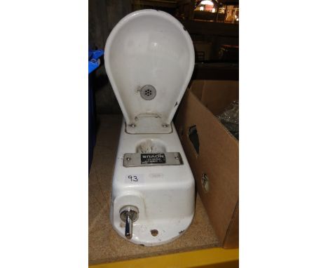 A reclaimed Novus white glazed ceramic/stoneware wall mounted  drinking water fountain