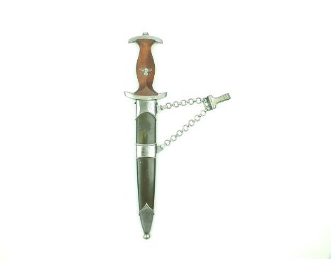 A Third Reich NPEA leader's chained dagger, 22cm flattened diamond section blade by KARLBURGSMULLER BERLIN, etched with the m