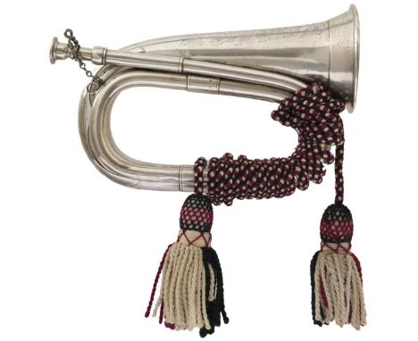 An hallmarked silver bugle by Boosey & Co. to the 2nd Bn The North Staffordshire Regiment, London 1926, profusely etched with