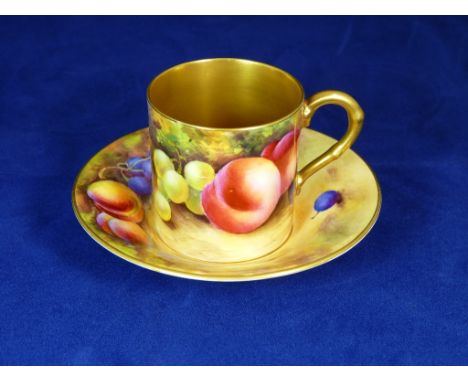 A Royal Worcester cabinet coffee can and saucer painted by William Hale with peaches and grapes, signed, dark blue factory ma