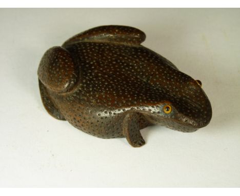 Treen - a late 19th Century carved wood toad snuff box, with inset glass eyes, sliding base, the base carved with initials "J