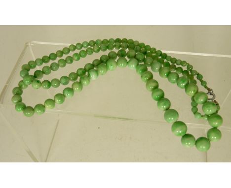 A long jade graduated bead necklace, total length 28" approx