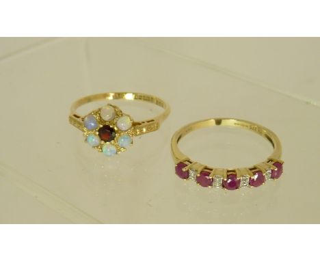 A 9ct gold ruby and diamond ring, size T, total weight 2.3g together with a 9ct gold garnet and opal cluster ring size T, tot