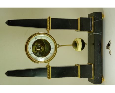 A French style, reproduction Portico marble mantel clock, designed as two obelisks supporting the central drum clock, rectang