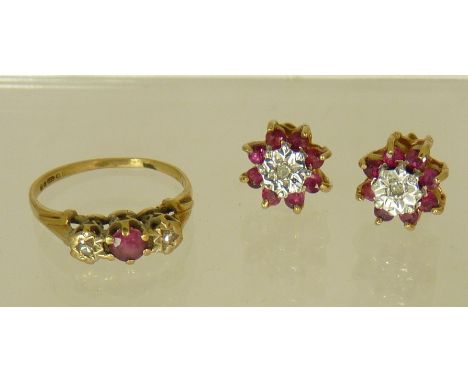 A small 9ct gold ring set with a central ruby with small diamonds to either side, size J and a similar pair of pierced stud e